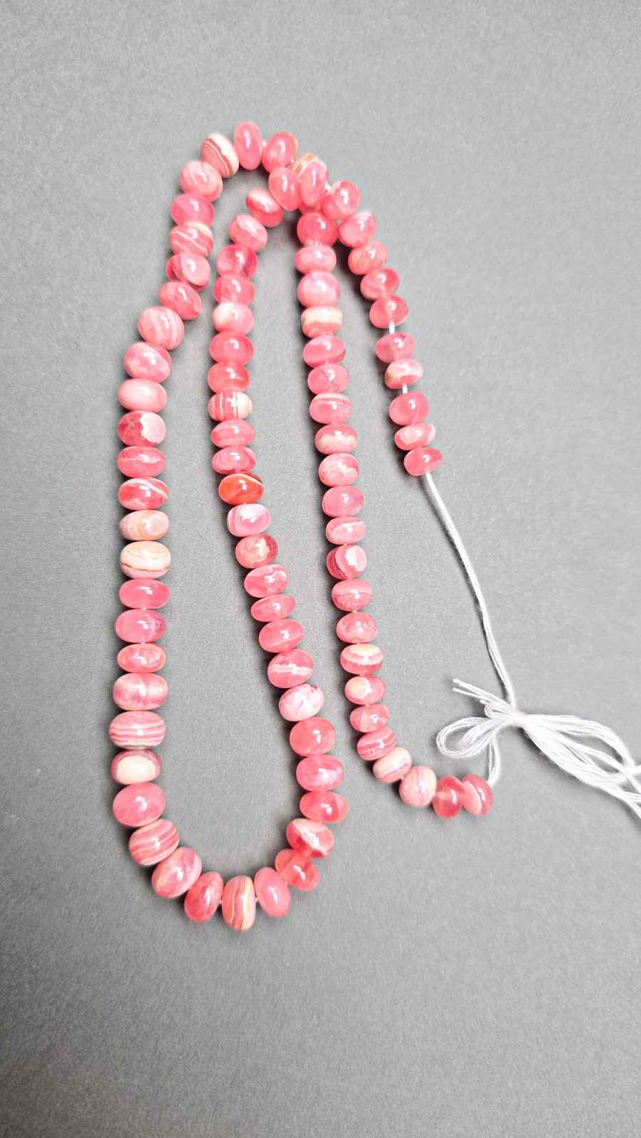 Rhodocrosites smooth rondelles with beautiful cream, marble like bands