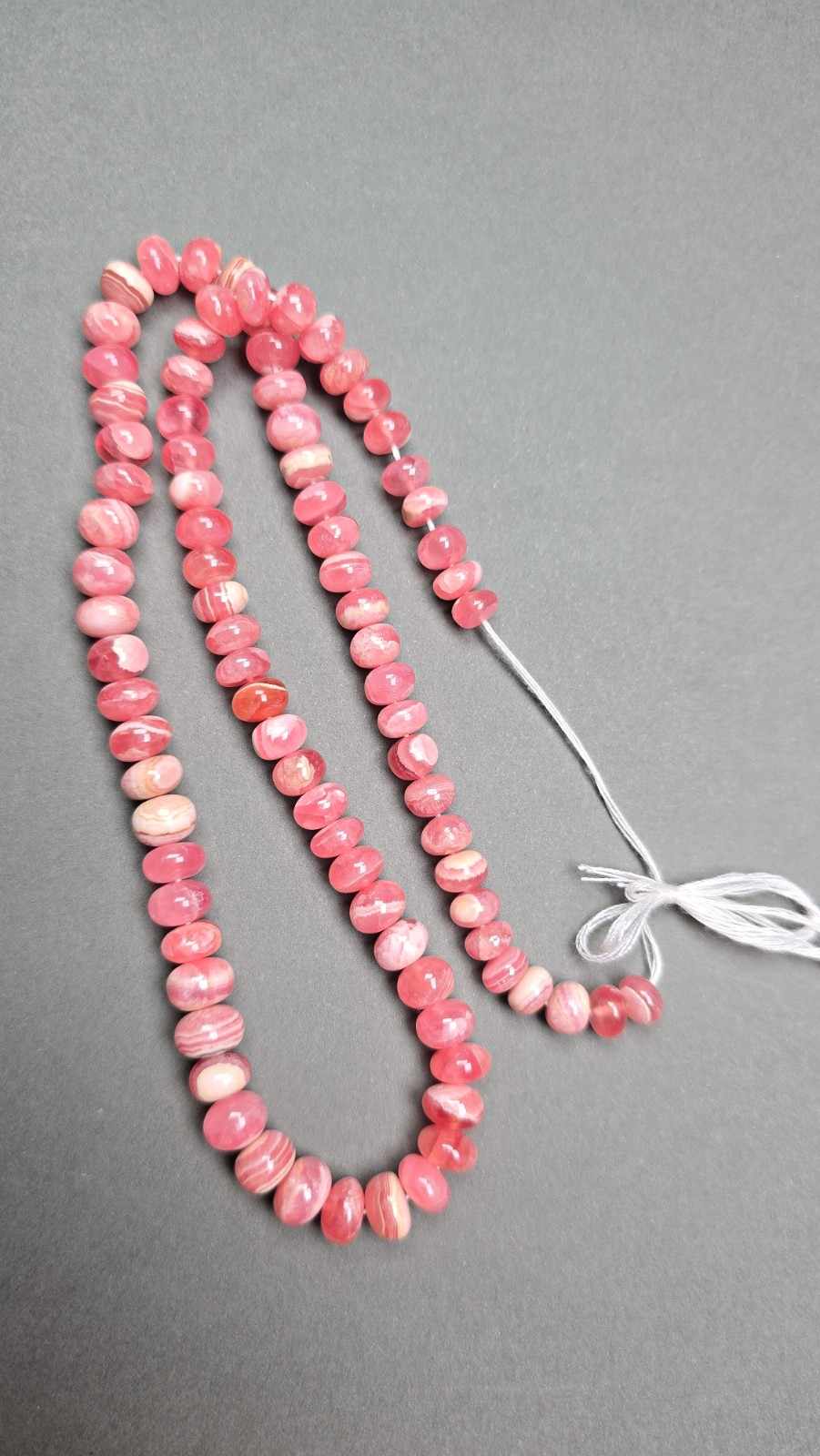 Rhodocrosites smooth rondelles with beautiful cream, marble like bands